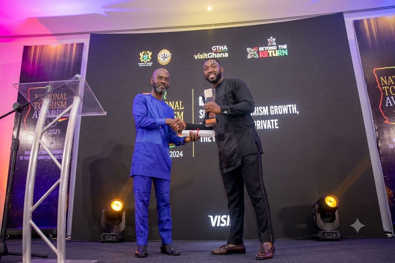 Receiving an award on stage at the National Tourism Awards