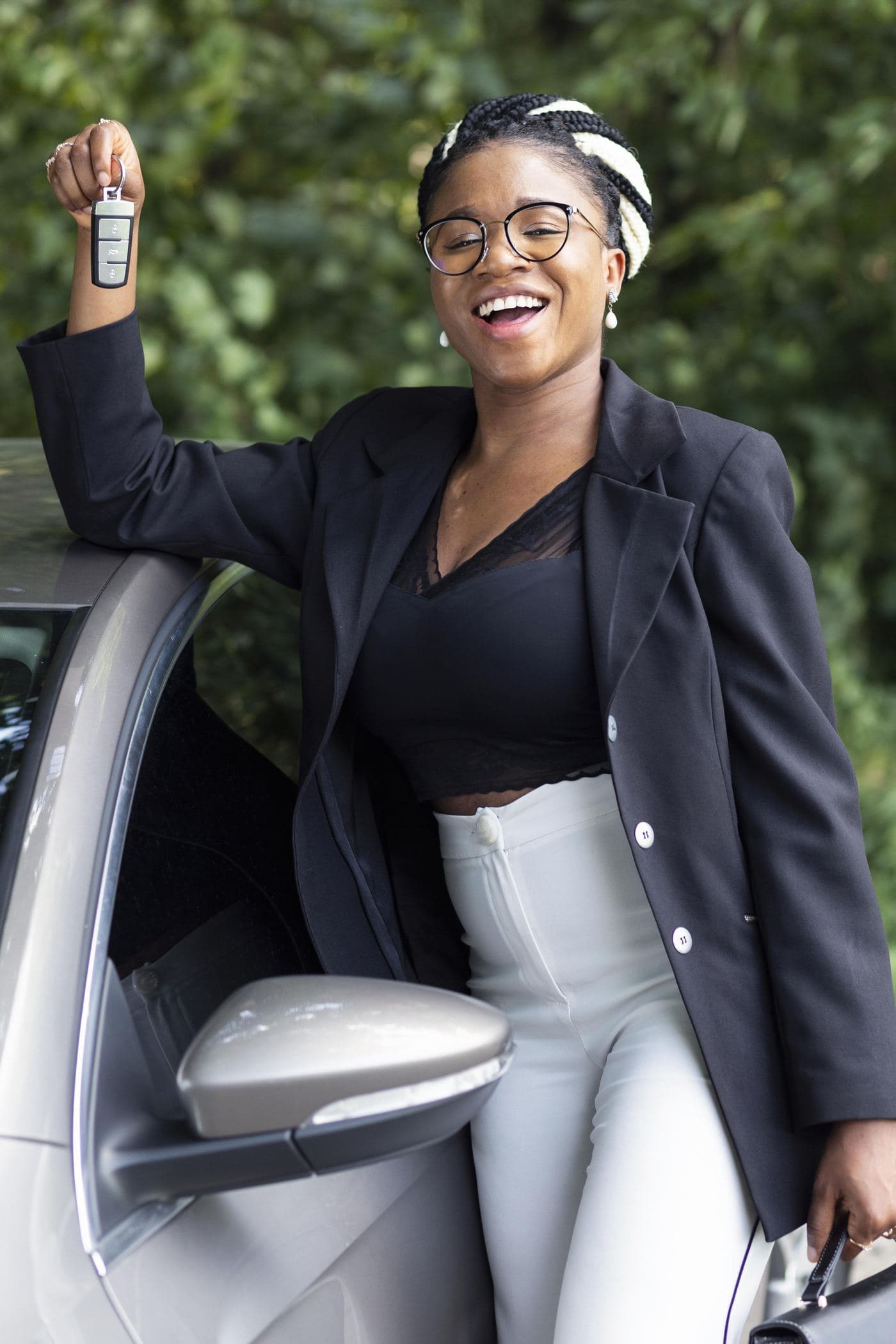 Client holding the keys to a leased vehicle
